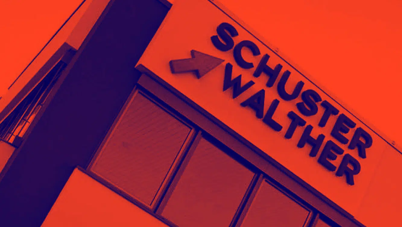 Bilder Historie_Logo an Hauswand